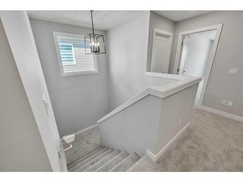 219 Dawson Wharf Rise, Chestermere, AB - Indoor Photo Showing Other Room