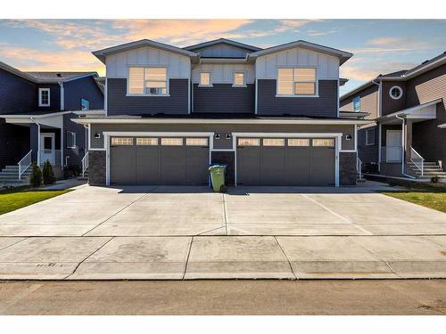 219 Dawson Wharf Rise, Chestermere, AB - Outdoor With Facade