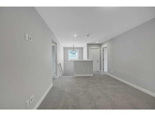 219 Dawson Wharf Rise, Chestermere, AB - Indoor Photo Showing Other Room