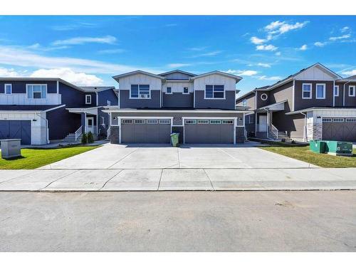 219 Dawson Wharf Rise, Chestermere, AB - Outdoor With Facade