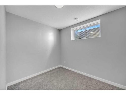 219 Dawson Wharf Rise, Chestermere, AB - Indoor Photo Showing Other Room