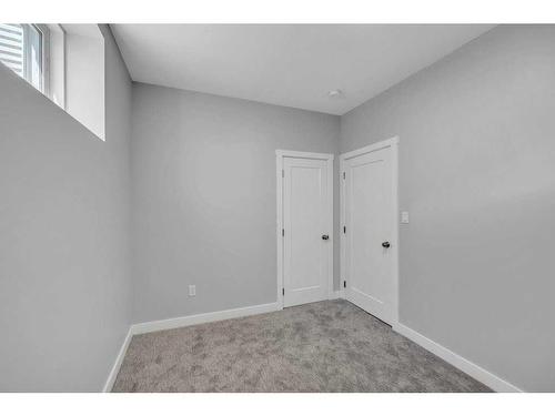 219 Dawson Wharf Rise, Chestermere, AB - Indoor Photo Showing Other Room