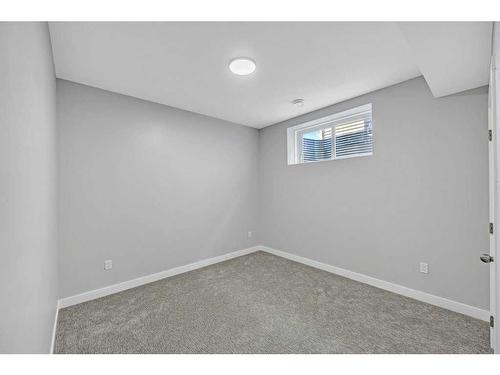 219 Dawson Wharf Rise, Chestermere, AB - Indoor Photo Showing Other Room