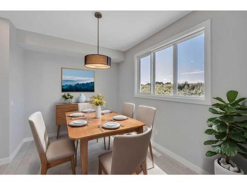 219 Dawson Wharf Rise, Chestermere, AB - Indoor Photo Showing Dining Room