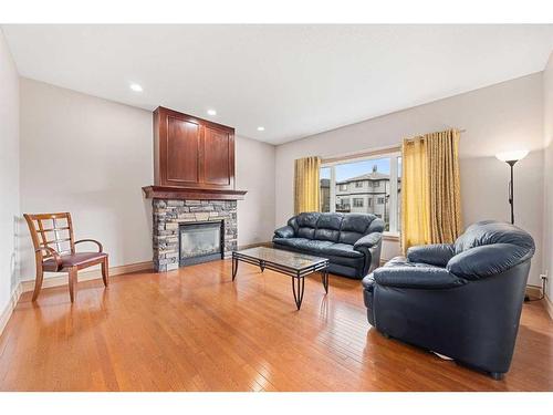 151 Cove Close, Chestermere, AB - Indoor Photo Showing Living Room With Fireplace