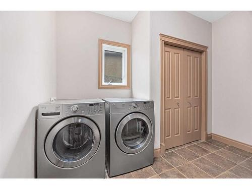 151 Cove Close, Chestermere, AB - Indoor Photo Showing Laundry Room