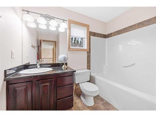 151 Cove Close, Chestermere, AB - Indoor Photo Showing Bathroom