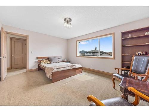 151 Cove Close, Chestermere, AB - Indoor Photo Showing Bedroom