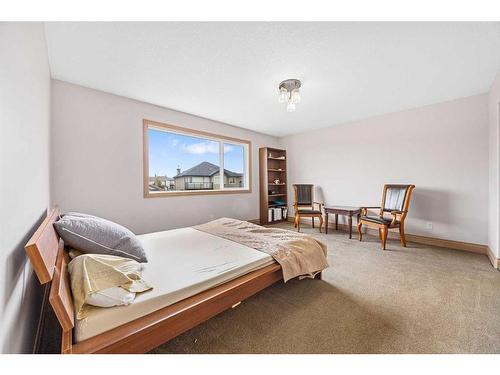 151 Cove Close, Chestermere, AB - Indoor Photo Showing Bedroom