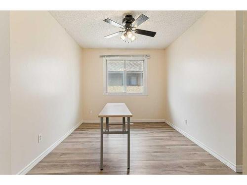 7008B Bowness Road Nw, Calgary, AB - Indoor Photo Showing Other Room