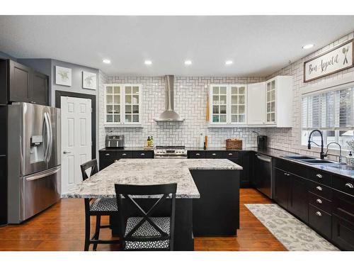 71 Chaparral Circle Se, Calgary, AB - Indoor Photo Showing Kitchen With Double Sink With Upgraded Kitchen