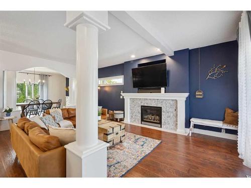 71 Chaparral Circle Se, Calgary, AB - Indoor Photo Showing Living Room With Fireplace