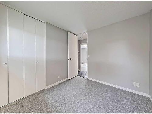 104 Oakfield Place Sw, Calgary, AB - Indoor Photo Showing Other Room