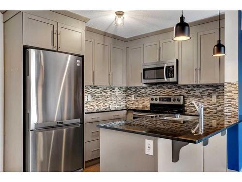 6408-155 Skyview Ranch Way Ne, Calgary, AB - Indoor Photo Showing Kitchen With Stainless Steel Kitchen With Double Sink With Upgraded Kitchen