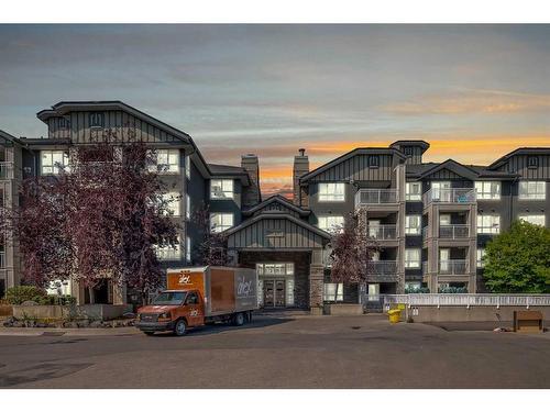 312-35 Richard Court Sw, Calgary, AB - Outdoor With Balcony With Facade