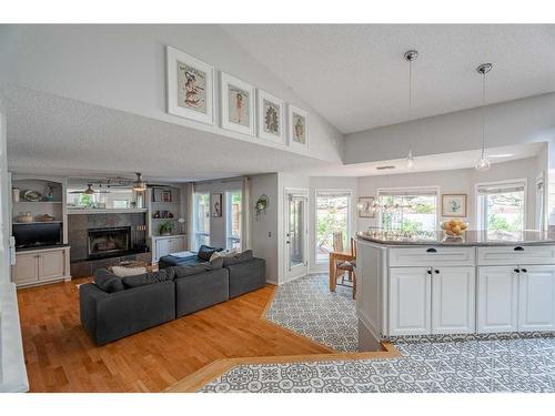 2745 Douglasdale Boulevard Se, Calgary, AB - Indoor Photo Showing Other Room With Fireplace