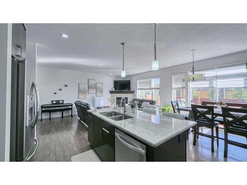 127 Evanswood Circle Nw, Calgary, AB - Indoor Photo Showing Kitchen With Double Sink With Upgraded Kitchen