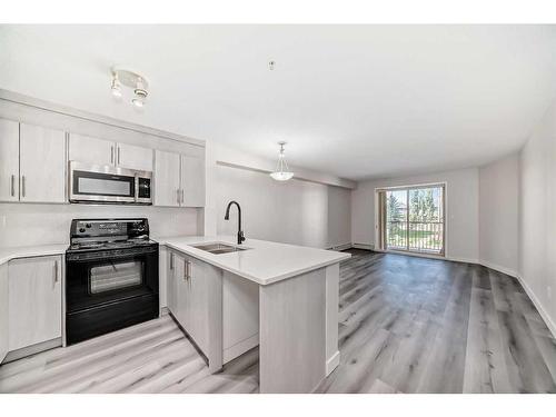 3203-16969 24 Street Sw, Calgary, AB - Indoor Photo Showing Kitchen With Upgraded Kitchen