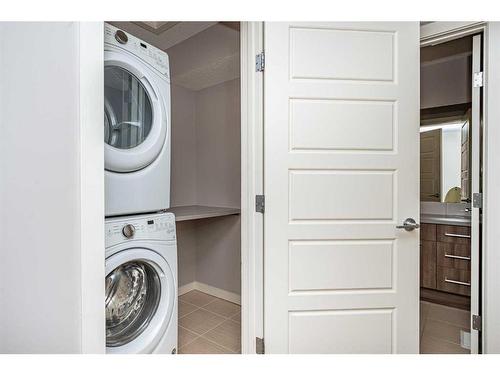 8431 Saddlebrook Drive Ne, Calgary, AB - Indoor Photo Showing Laundry Room