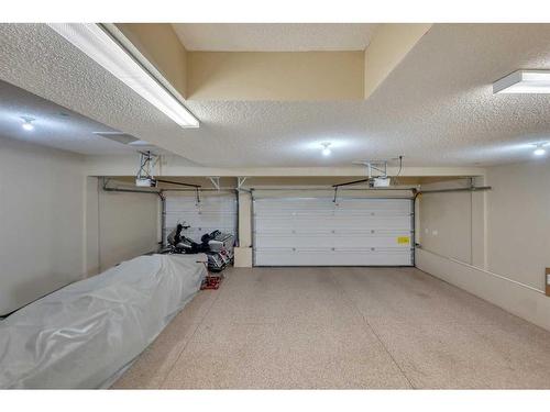 113 West Lakeview Crescent, Chestermere, AB - Indoor Photo Showing Garage