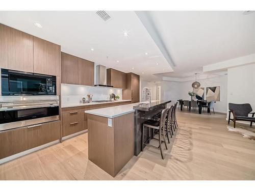 202-88 Waterfront Mews Sw, Calgary, AB - Indoor Photo Showing Kitchen