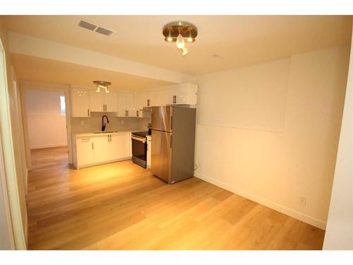 25 Martinvalley Road Ne, Calgary, AB - Indoor Photo Showing Kitchen