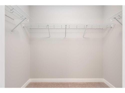 2403-55 Lucas Way Nw, Calgary, AB - Indoor With Storage