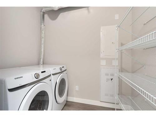 2403-55 Lucas Way Nw, Calgary, AB - Indoor Photo Showing Laundry Room