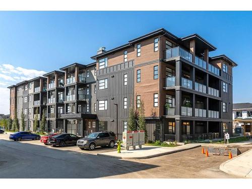 2403-55 Lucas Way Nw, Calgary, AB - Outdoor With Balcony With Facade