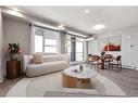 2403-55 Lucas Way Nw, Calgary, AB  - Indoor Photo Showing Living Room 