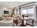 2403-55 Lucas Way Nw, Calgary, AB  - Indoor Photo Showing Living Room 