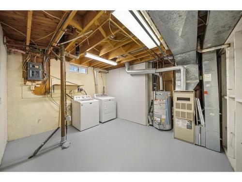 728 Mapleton Drive Se, Calgary, AB - Indoor Photo Showing Laundry Room