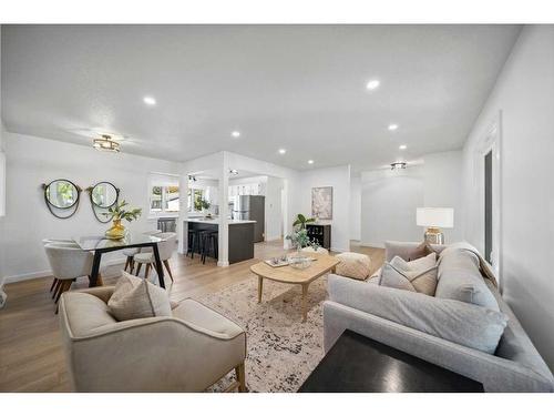 728 Mapleton Drive Se, Calgary, AB - Indoor Photo Showing Living Room