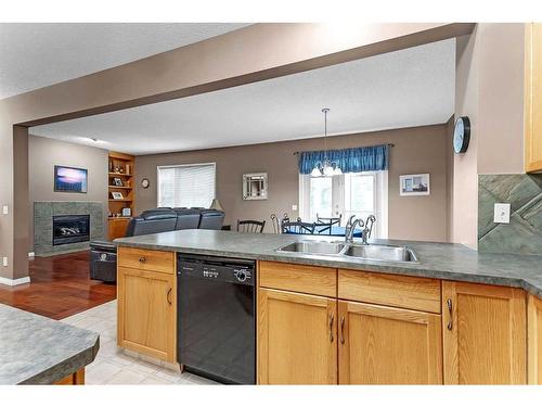 43 Panorama Hills Crescent Nw, Calgary, AB - Indoor Photo Showing Kitchen With Fireplace With Double Sink