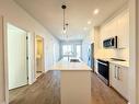 2304-395 Skyview Parkway Ne, Calgary, AB  - Indoor Photo Showing Kitchen With Double Sink 