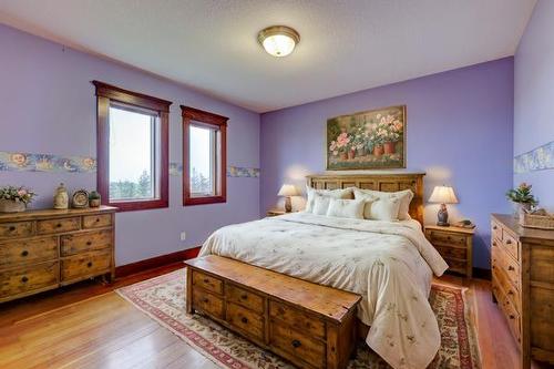 254041 Twp Road 252, Strathmore, AB - Indoor Photo Showing Bedroom