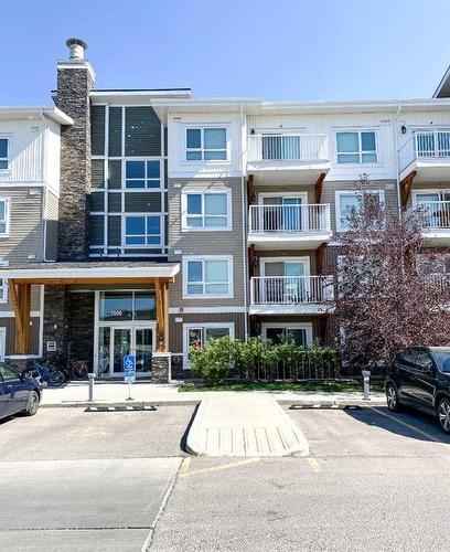 7310-302 Skyview Ranch Drive Ne, Calgary, AB - Outdoor With Balcony With Facade