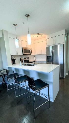 7310-302 Skyview Ranch Drive Ne, Calgary, AB - Indoor Photo Showing Kitchen With Stainless Steel Kitchen With Upgraded Kitchen