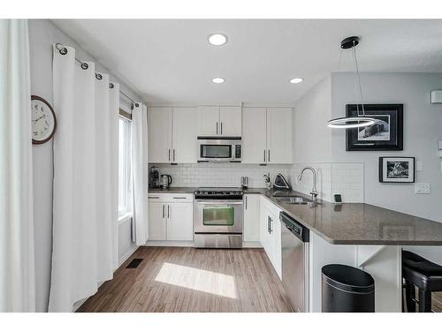 1410 Auburn Bay Square Se, Calgary, AB - Indoor Photo Showing Kitchen With Stainless Steel Kitchen With Upgraded Kitchen