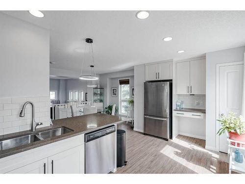 1410 Auburn Bay Square Se, Calgary, AB - Indoor Photo Showing Kitchen With Stainless Steel Kitchen With Double Sink