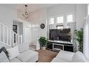 1410 Auburn Bay Square Se, Calgary, AB  - Indoor Photo Showing Living Room 