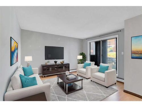 203-431 1 Avenue Ne, Calgary, AB - Indoor Photo Showing Living Room