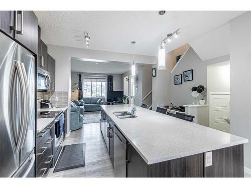 45 Legacy Glen Row Se, Calgary, AB - Indoor Photo Showing Kitchen With Double Sink With Upgraded Kitchen