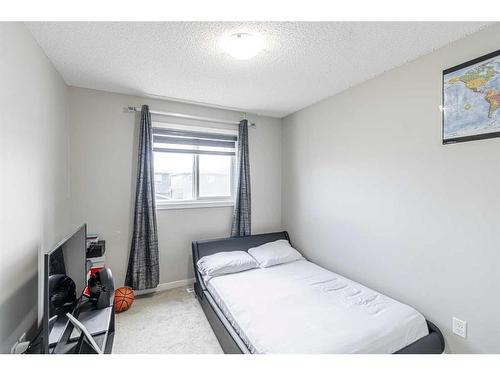 45 Legacy Glen Row Se, Calgary, AB - Indoor Photo Showing Bedroom