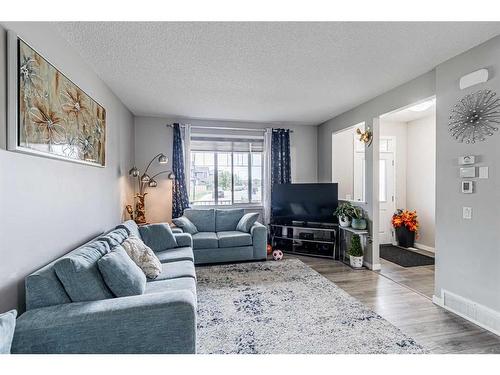 45 Legacy Glen Row Se, Calgary, AB - Indoor Photo Showing Living Room