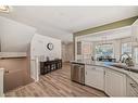 208 Scenic Acres Terrace Nw, Calgary, AB  - Indoor Photo Showing Kitchen With Double Sink 