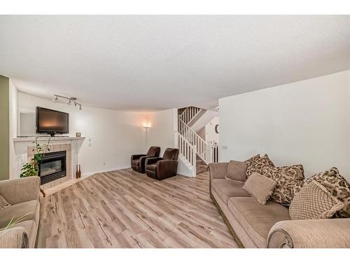 208 Scenic Acres Terrace Nw, Calgary, AB - Indoor Photo Showing Living Room With Fireplace