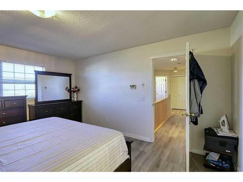 250 Coral Keys Court Ne, Calgary, AB - Indoor Photo Showing Bedroom