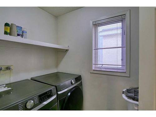 250 Coral Keys Court Ne, Calgary, AB - Indoor Photo Showing Laundry Room