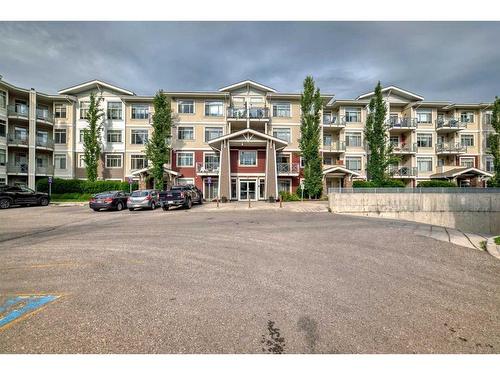 306-22 Auburn Bay Link Se, Calgary, AB - Outdoor With Balcony With Facade